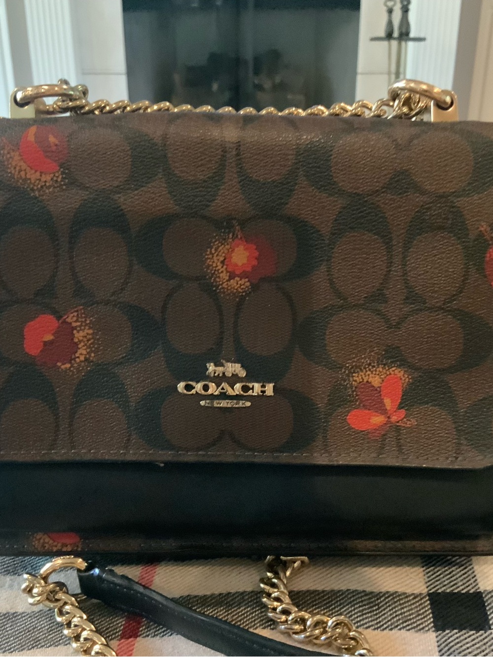 COACH Brown Signature Canvas Crossbody with Floral Accents and Gold Chain